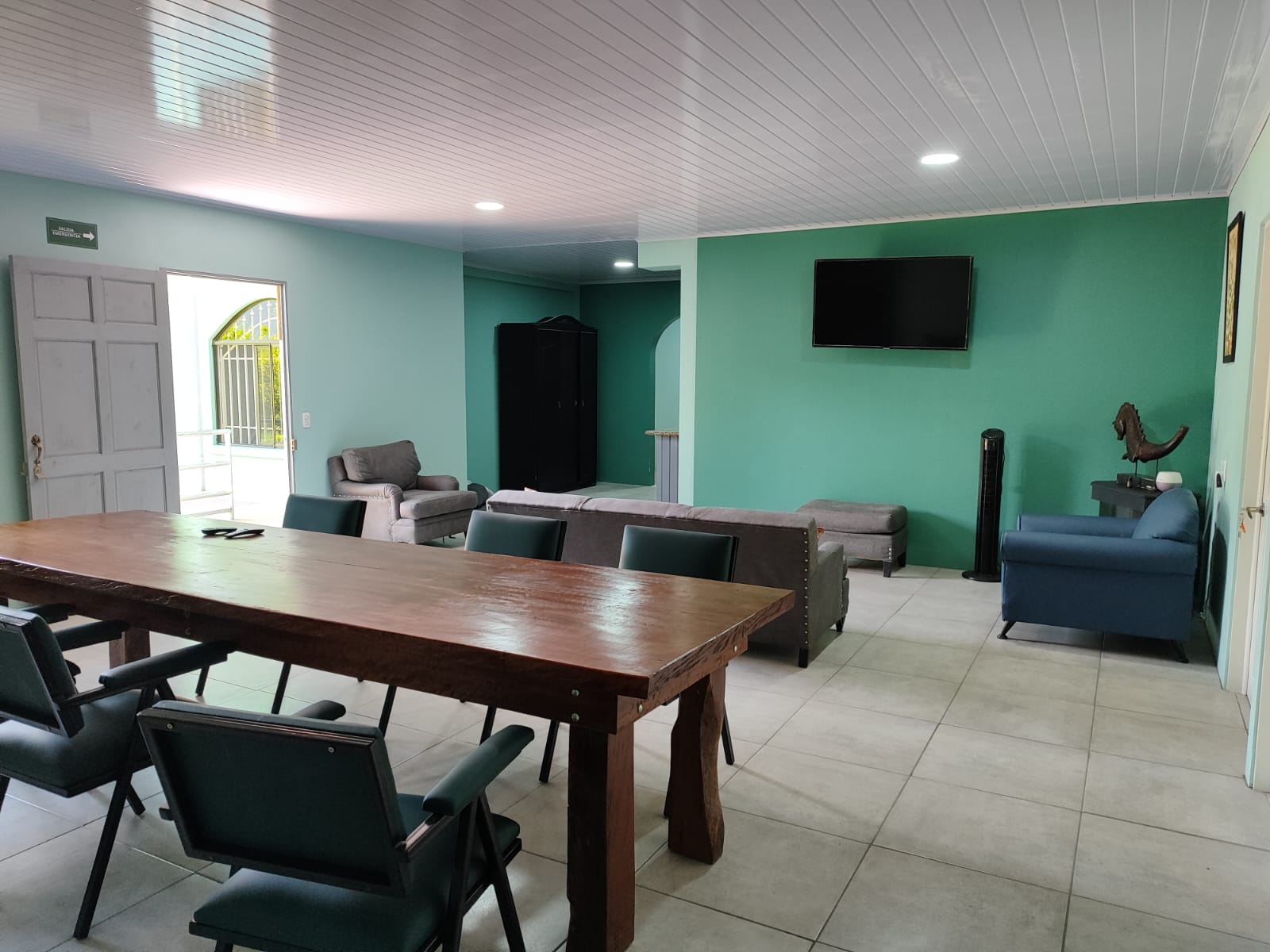 Dining area with wooden table and seating