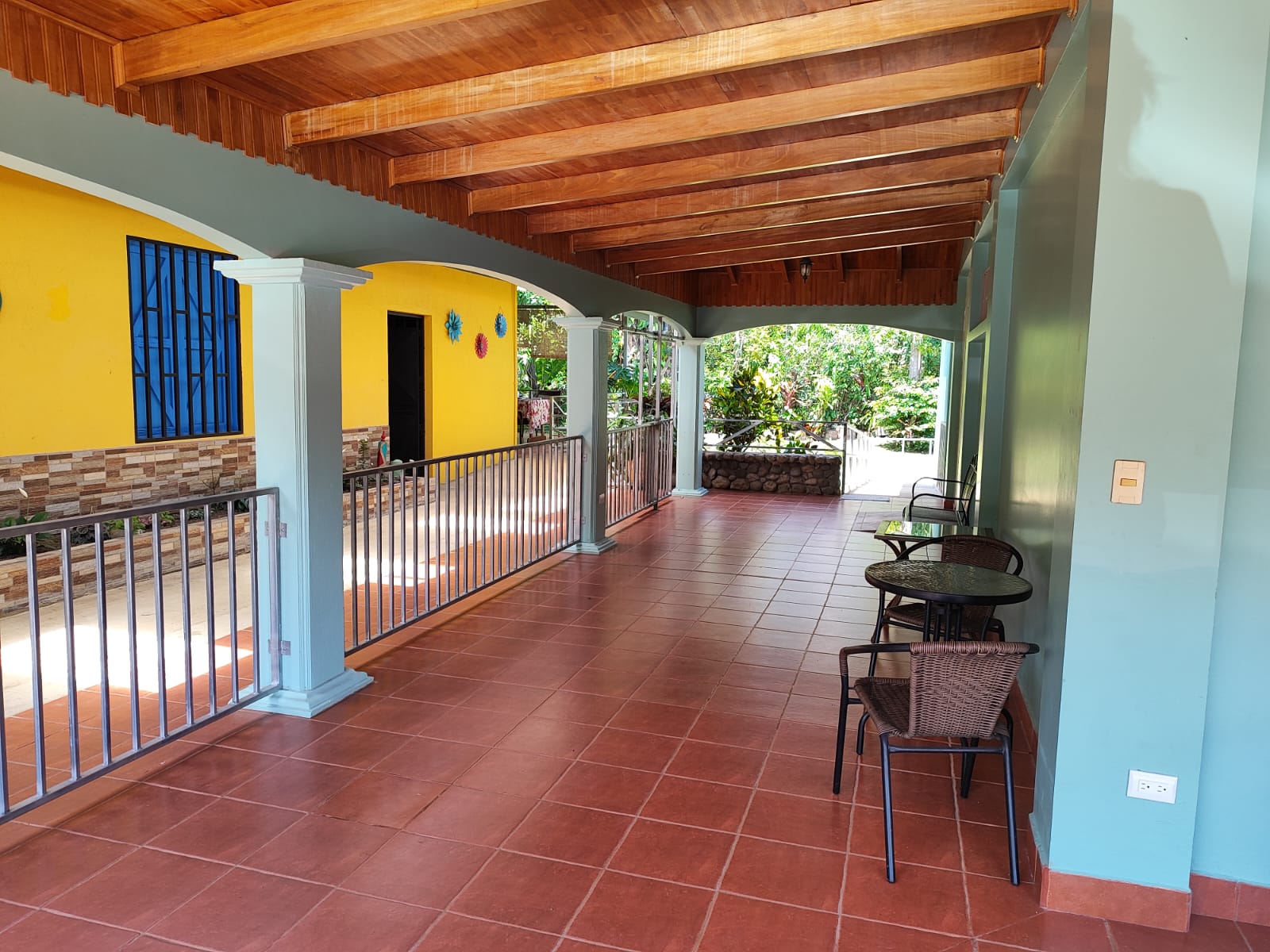 Covered terrace with outdoor seating